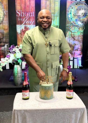 Pastor Wisdom in a bithday pose during his birthday celebration in October, 2025